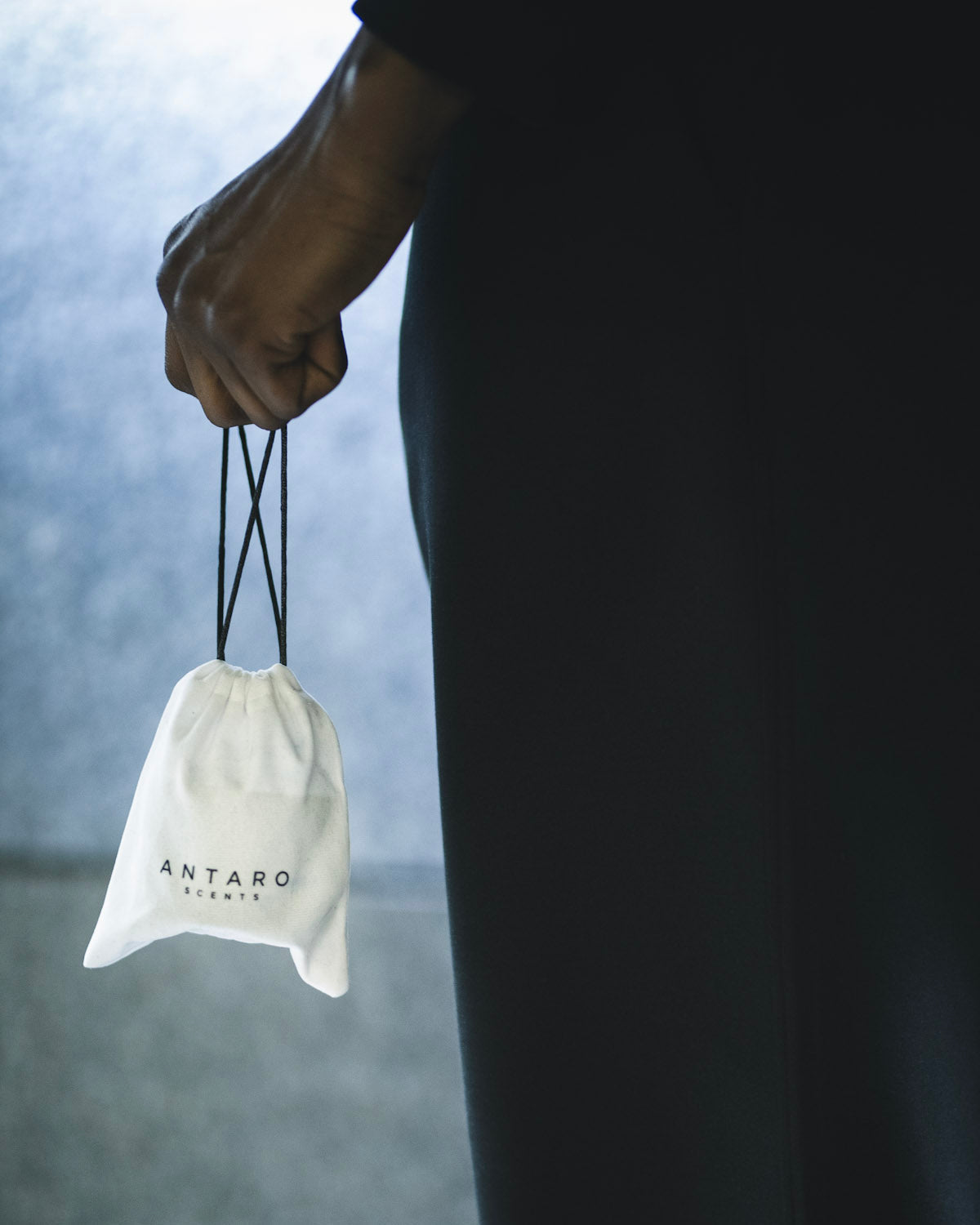 Carrying an Anywhere Collection cloth bag