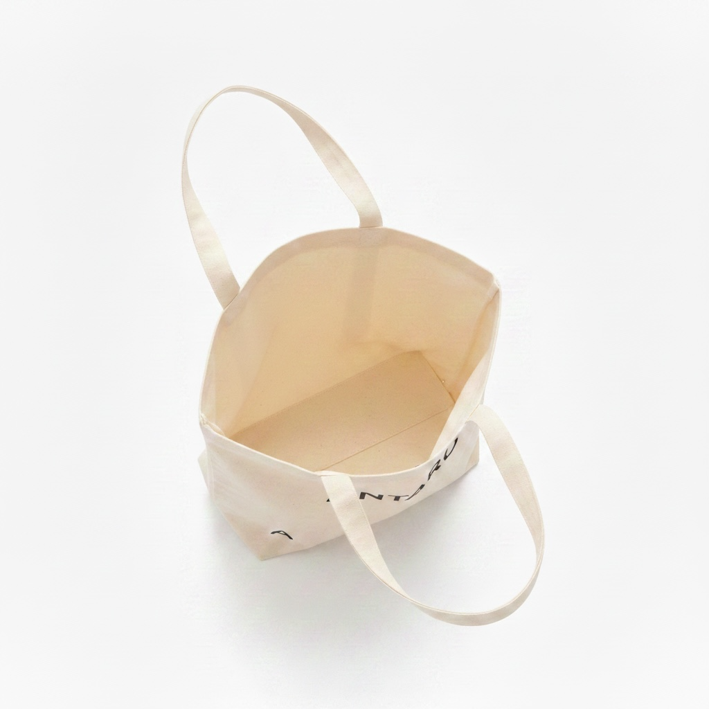 The ANTARO Everyday Tote in cream, open from above